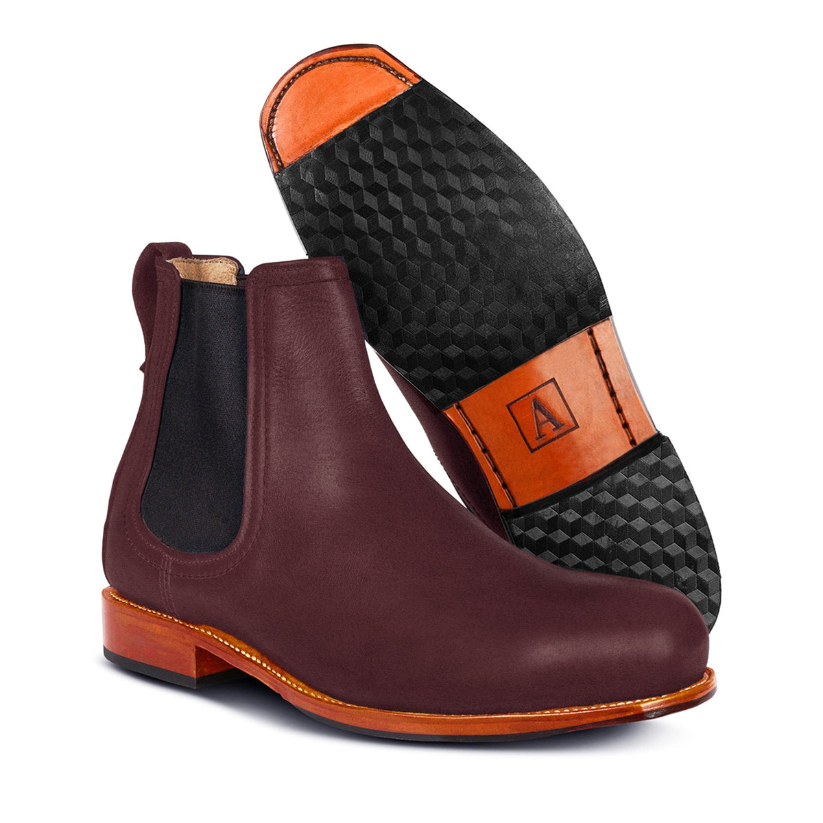 Men's extra-wide burgundy leather Chelsea boot, shown with the sole turned up, built to order, even in size 4.5 – The Mendoza