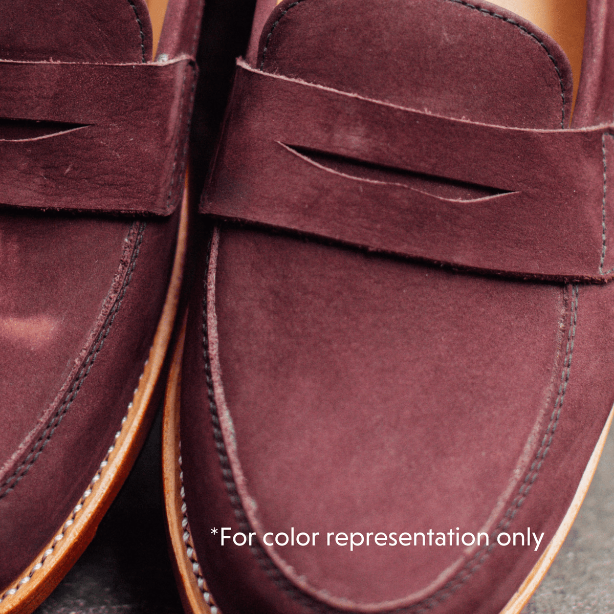 Close up of burgundy penny loafers with classic penny straps and detailed stitching, handcrafted by Adelante artisans