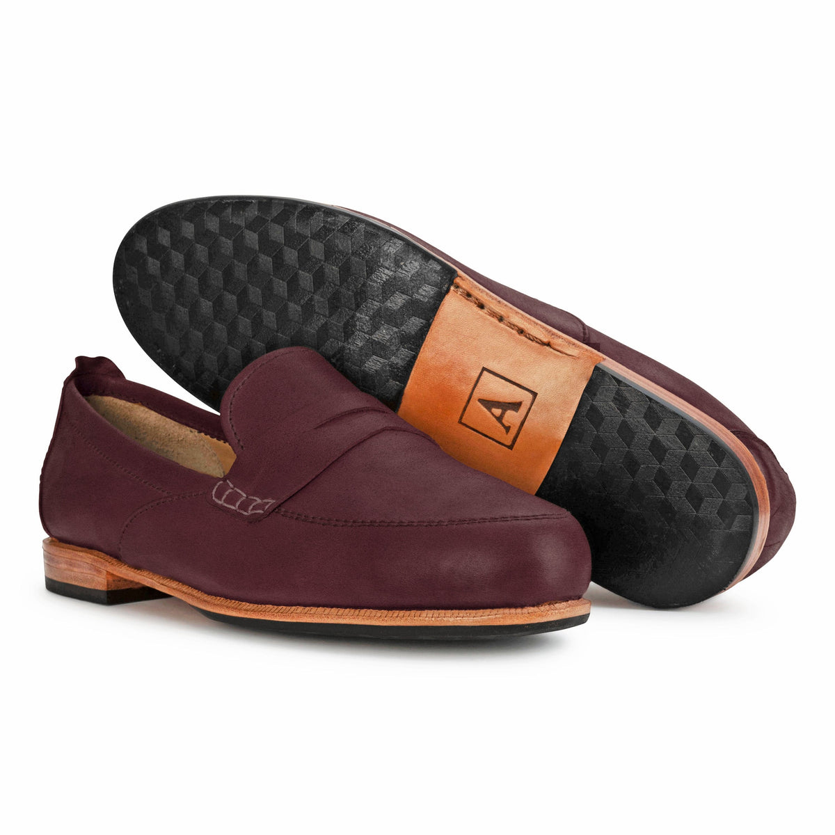 Women's 2E-wide burgundy leather dress loafers, shown with the sole turned up, can be made in size 9.5 – The Sabina