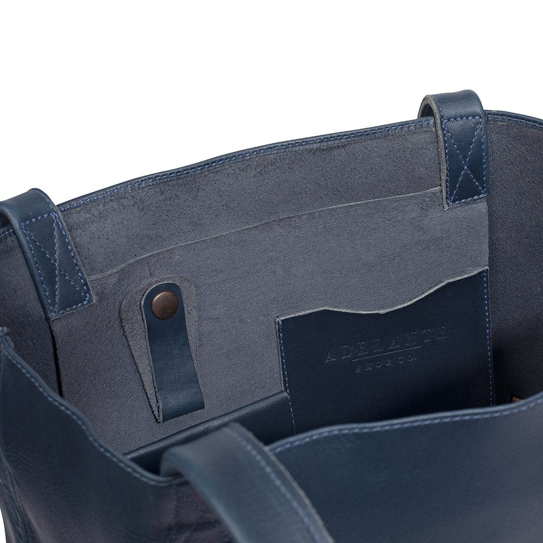 Blue leather tote bag, interior with pockets, made by hand by our artisans