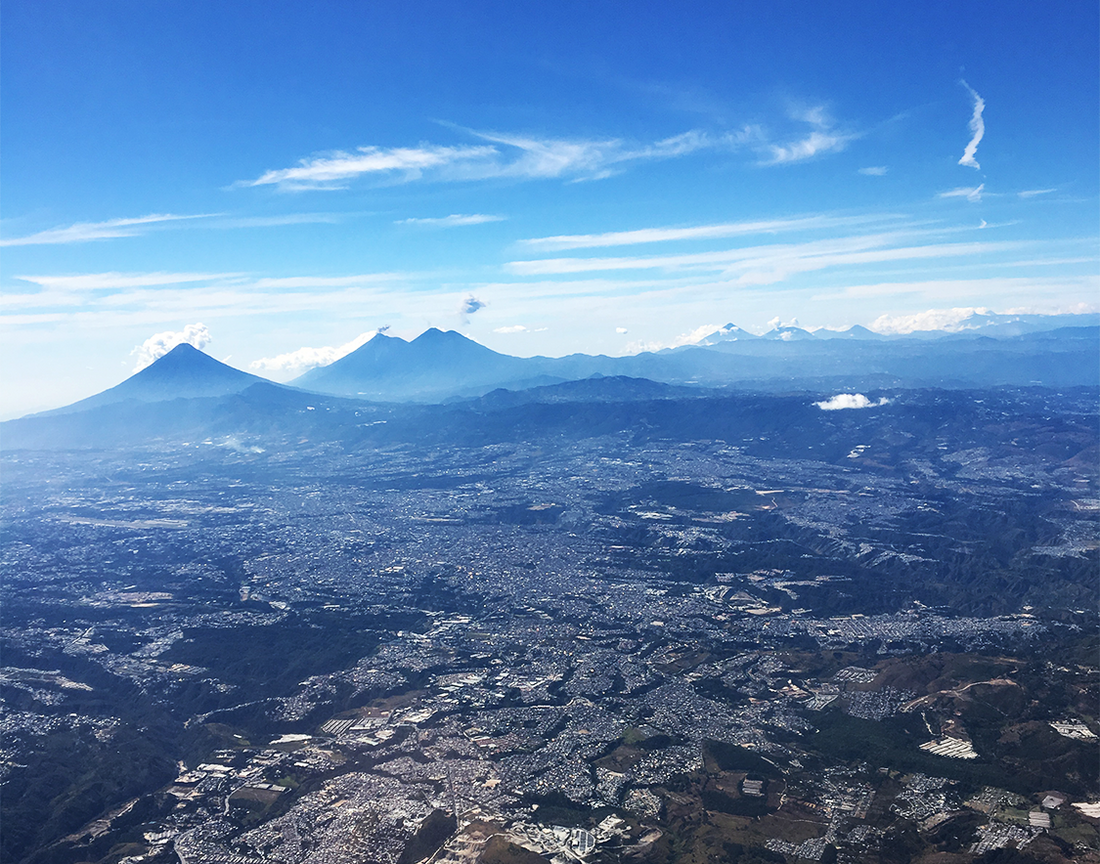 Aerial view of Guatemala's volcanoes above the clouds