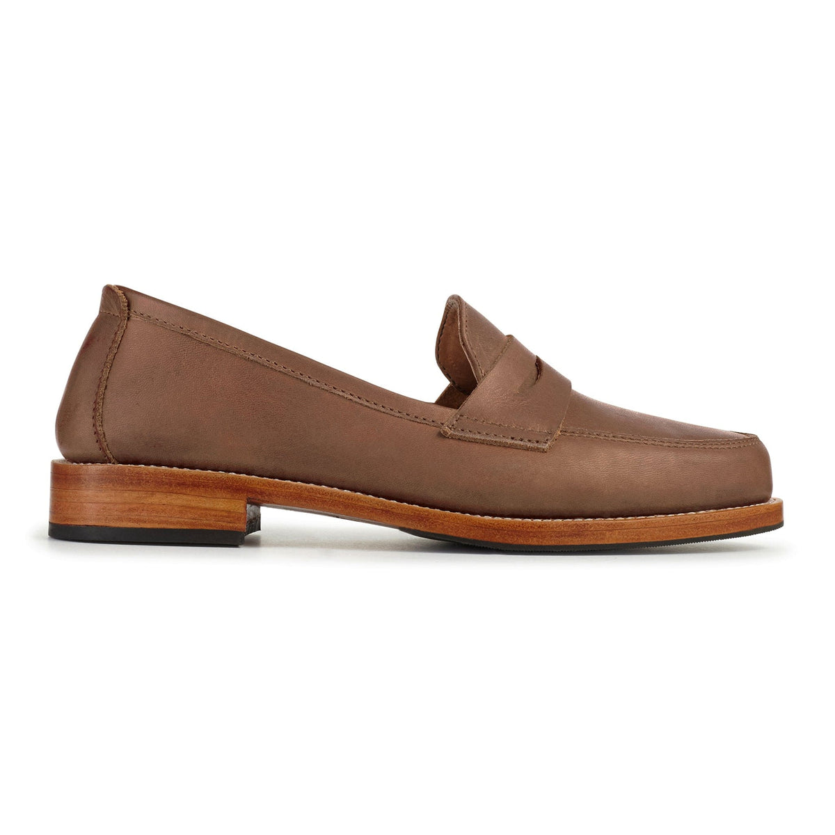 Brown leather women's penny loafer with a classic penny bridge and stacked heel