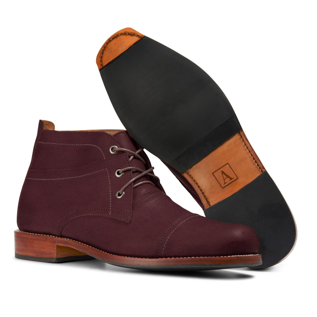 Men's 5E extra-wide burgundy leather fashion boot, showing the leather sole. Handcrafted to order in Guatemala