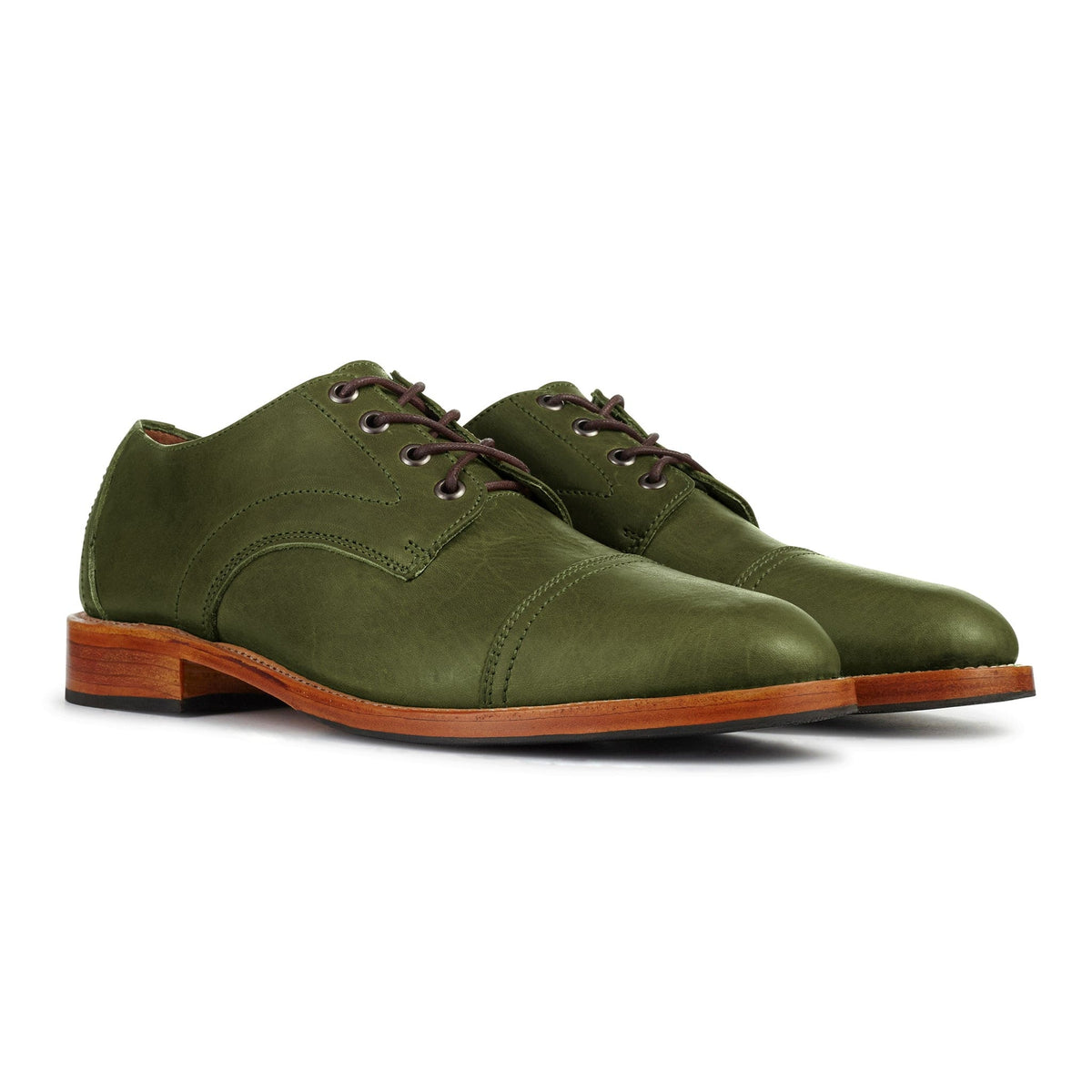 Men's 2E-wide green leather cap-toe derbies, shown from the front at an angle. Handcrafted to order in Guatemala – The Marco