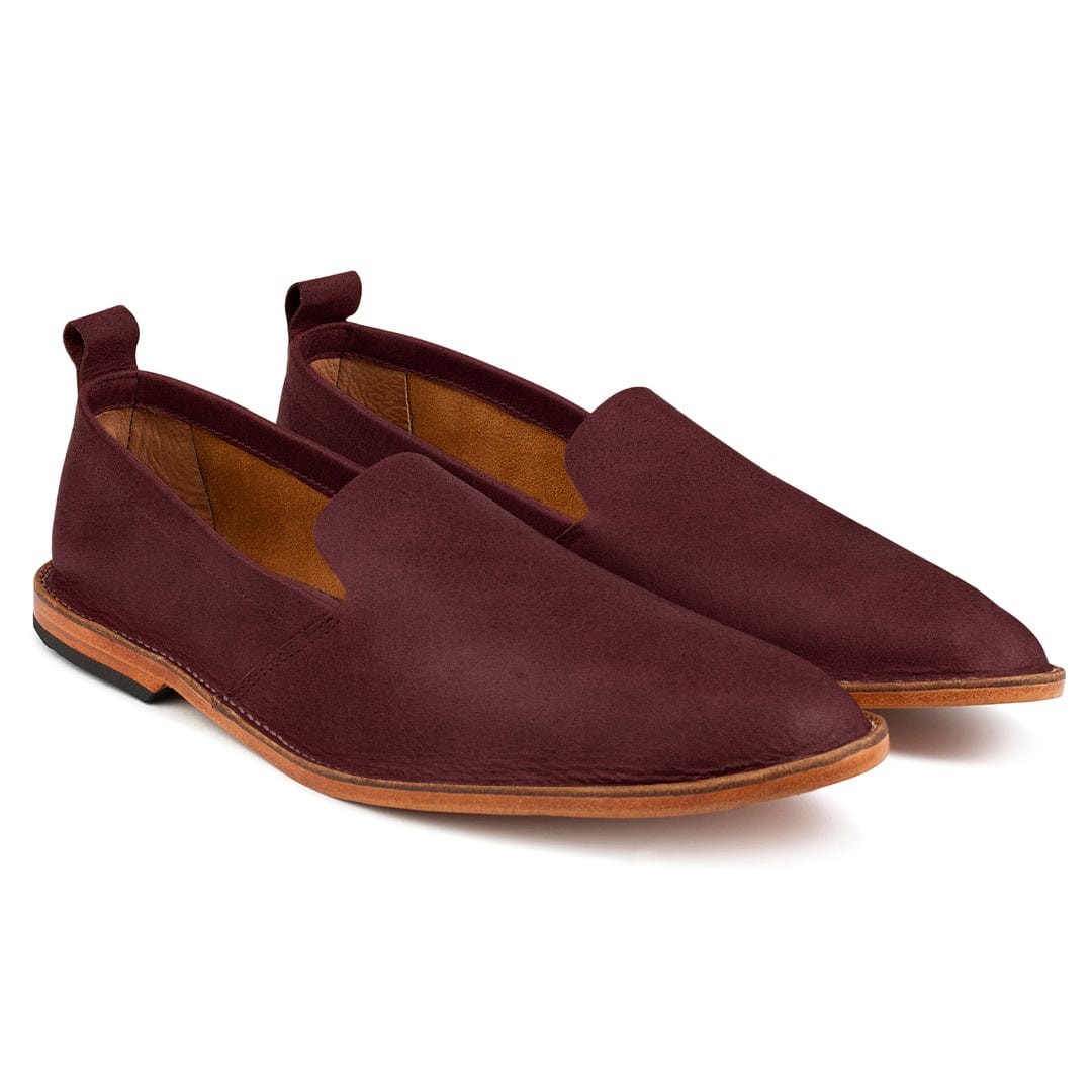 Pair of men's 4E-wide burgundy leather slip-ons, shown from the front at an angle, each pair made to order – The Viento