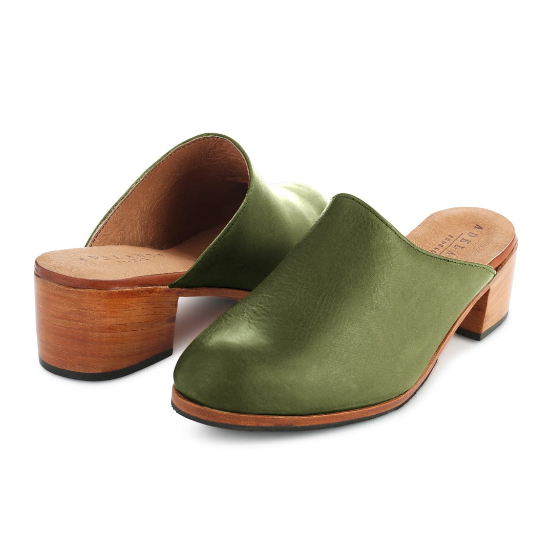 Women's 2E-wide green leather heeled mules, shown from the front at an angle. Available in every half size – The Camila