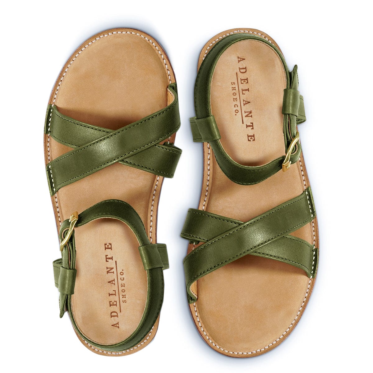 Women's green leather sandals with crisscross straps adjustable ankle buckles and cushioned footbeds by Adelante Made-To-Order