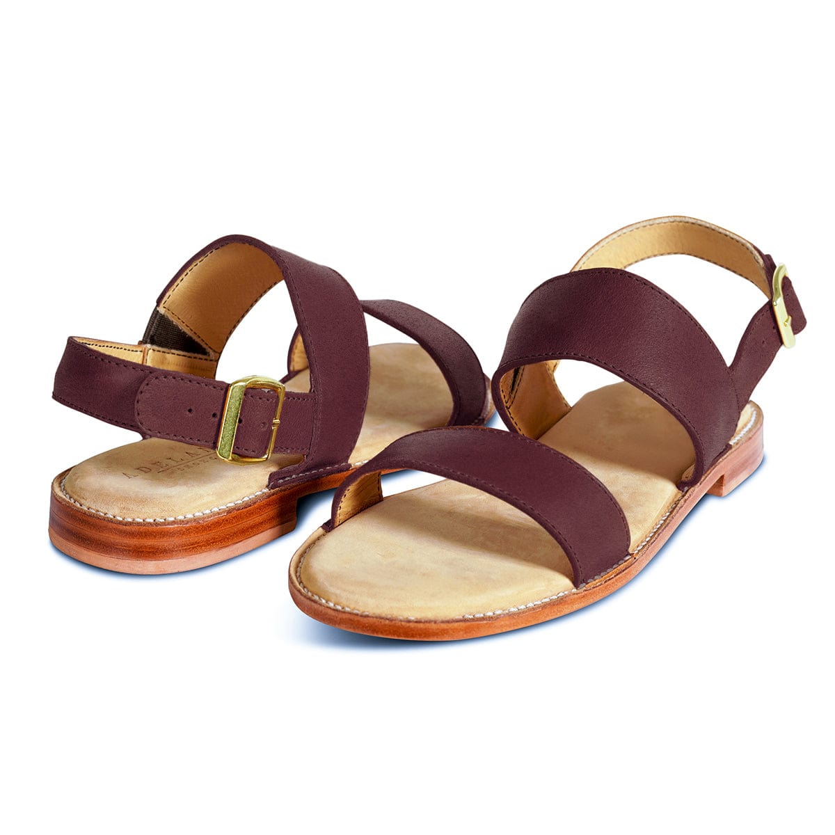 Women's EEE wide burgundy leather sandals, shown from the front at an angle. Crafted for wide and narrow feet – The Córdoba