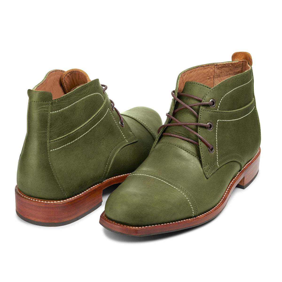 Men's wide green leather fashion boots, shown from the front at an angle. Crafted for wide and narrow feet – The Valparaíso