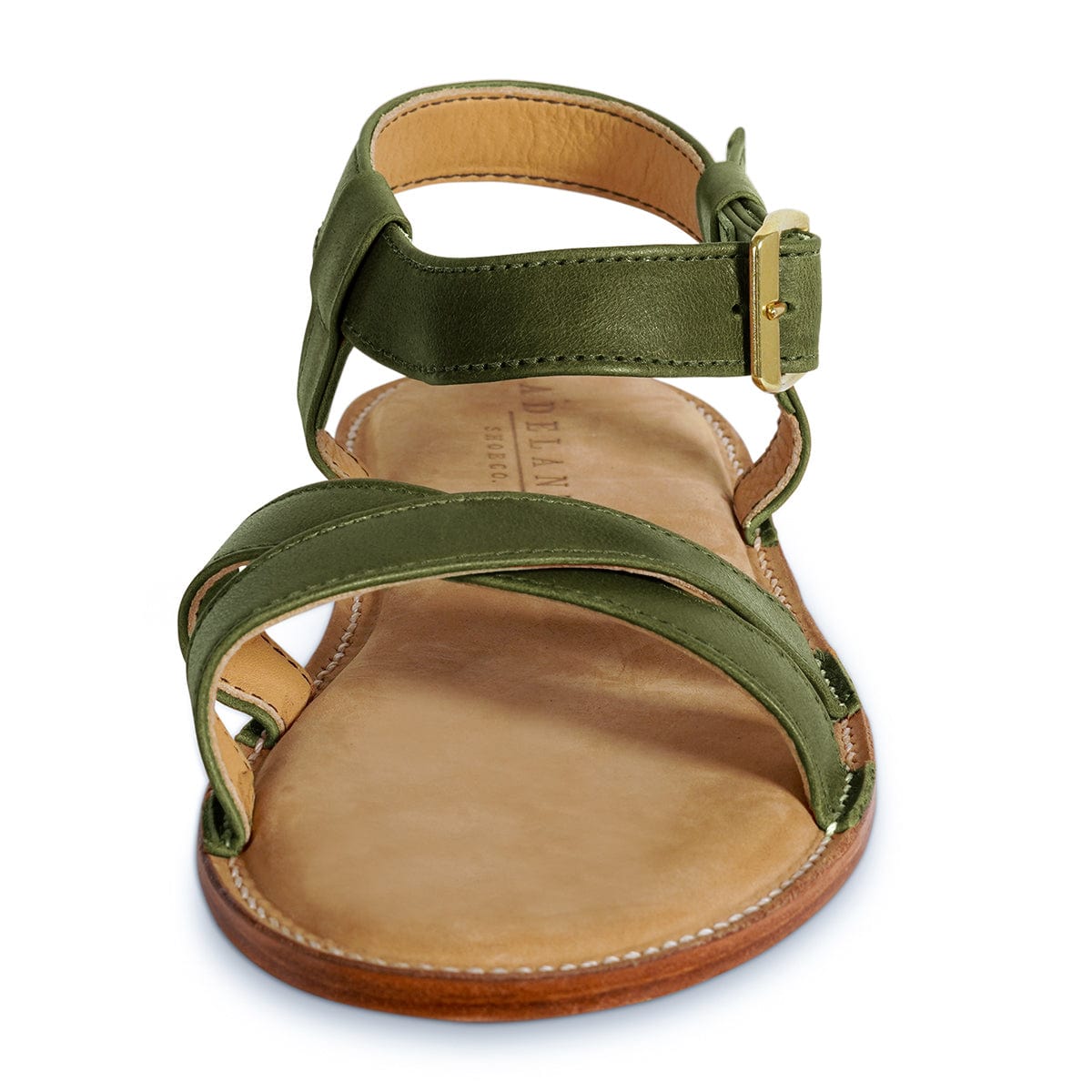 Olive green leather women's sandal with crossed straps, adjustable ankle buckle, cushioned footbed, and handcrafted construction, available in wide widths