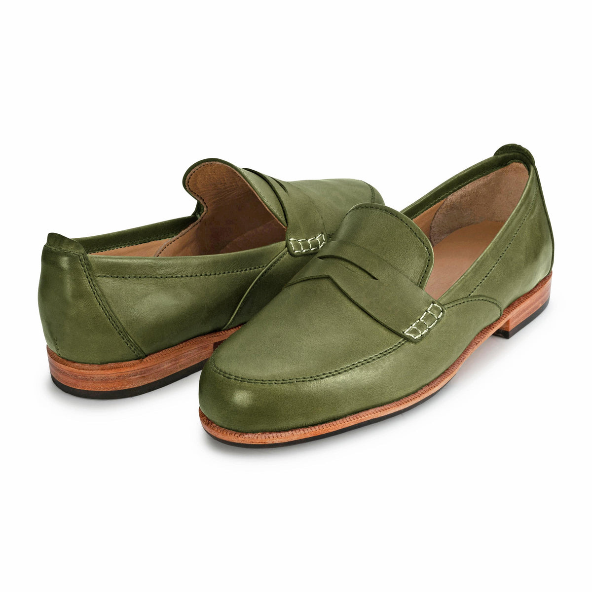 Pair of women's EEE wide green leather dress loafers, shown from the front at an angle – The Sabina