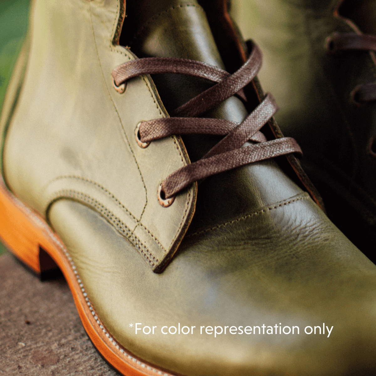 Close-up of the green leather on the women's shearling-lined winter boot – The Cozy Havana