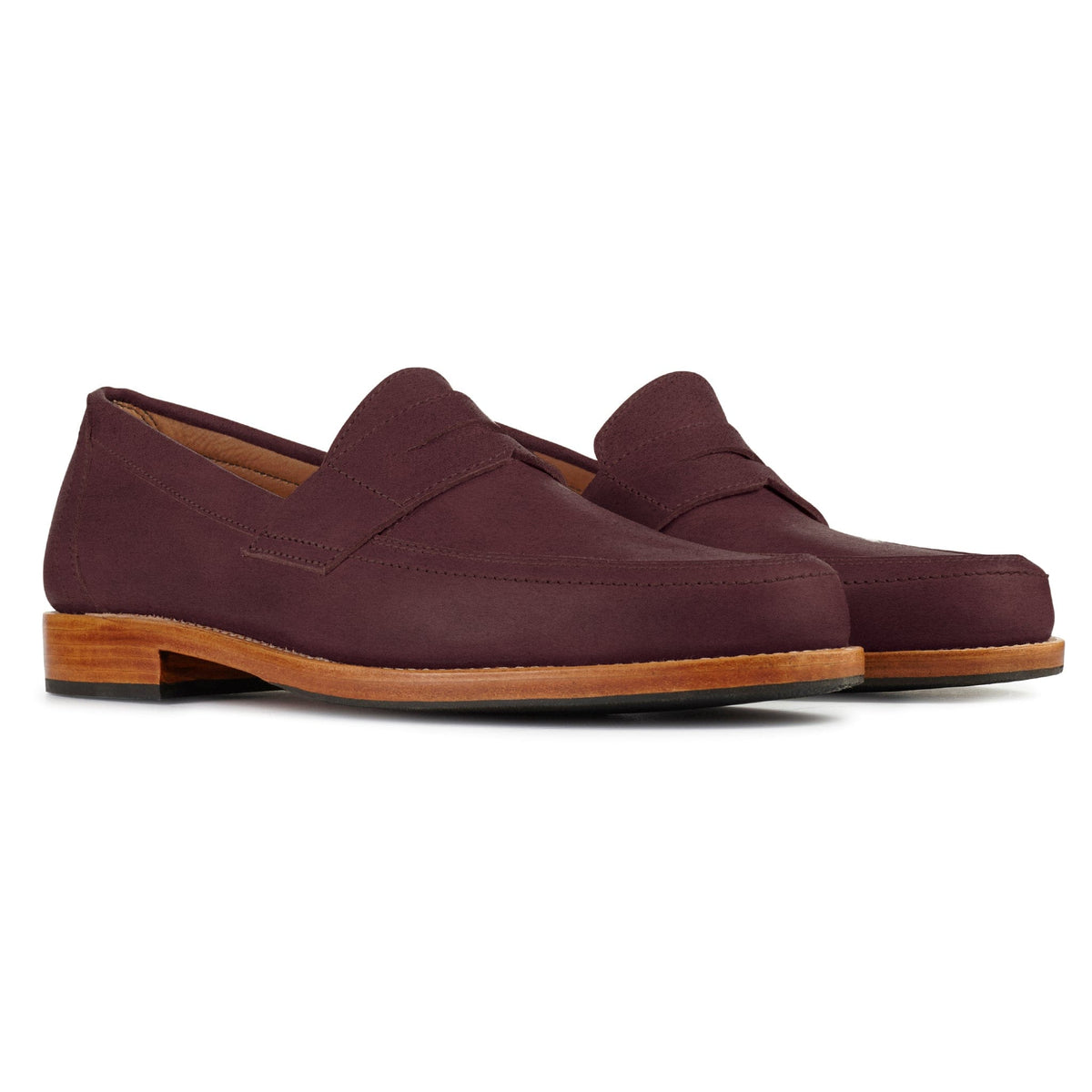 Burgundy men's penny loafers with classic penny bridges and stacked wood tone soles, handcrafted made to order by Adelante Shoes