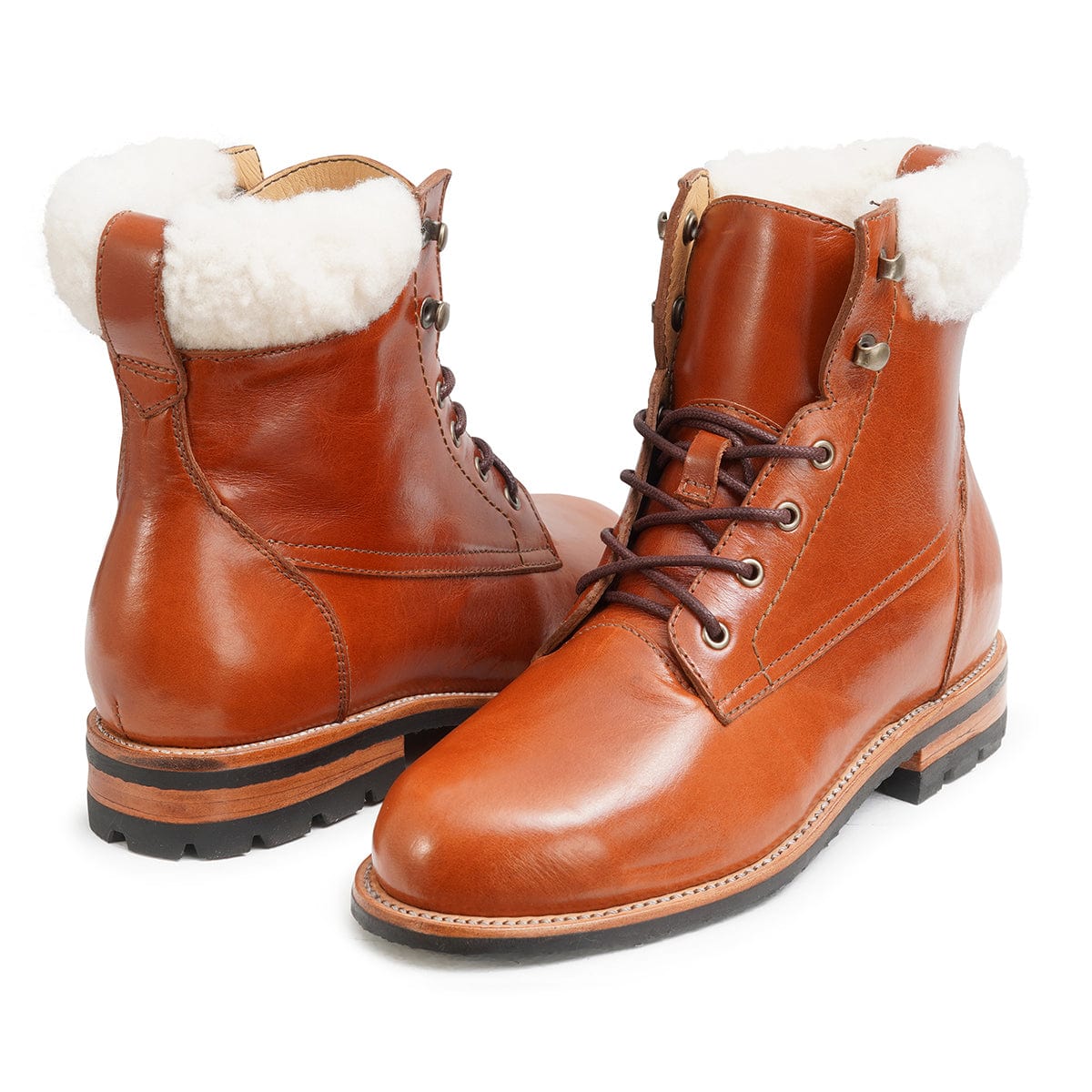 Women's 3E-wide shearling-lined reddish brown leather winter boots, shown from the front at an angle. For feet that are hard to fit