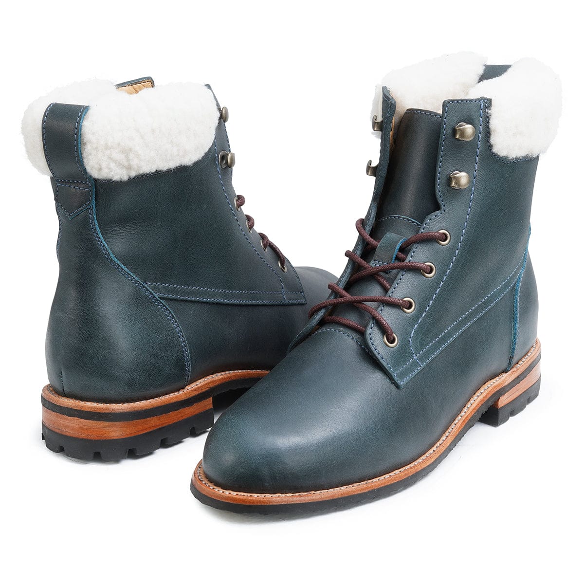 Women's 2E-wide shearling-lined blue leather winter boots, shown from the front at an angle. Available in every half size