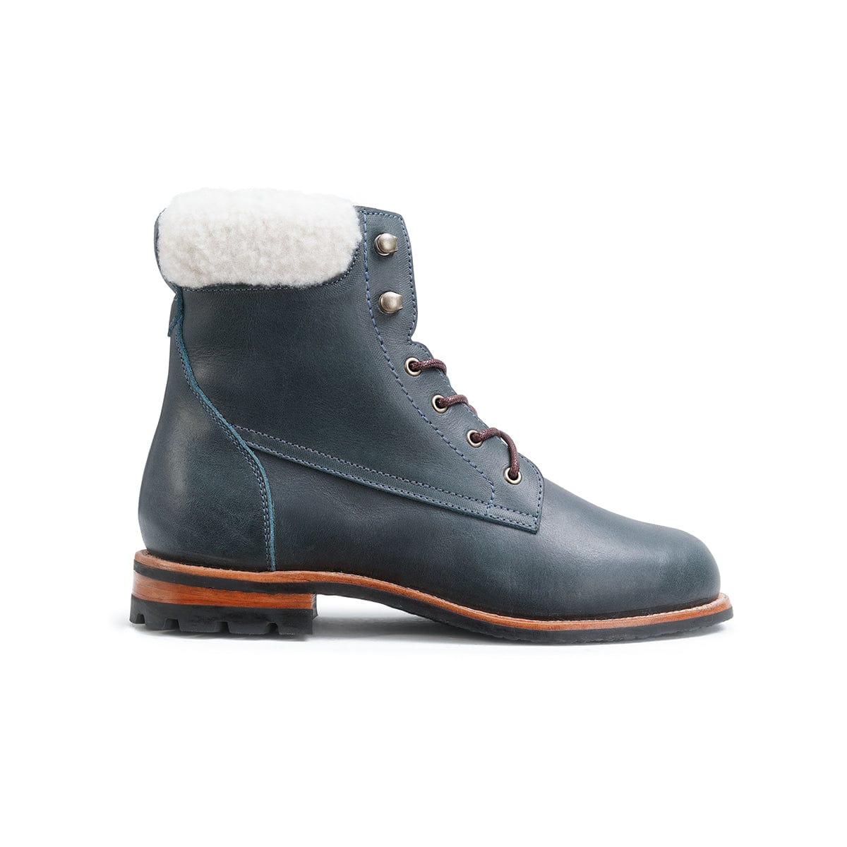Side view of a women's EE wide shearling-lined blue leather winter boot, can be made in size 9.5 – The Cozy Havana