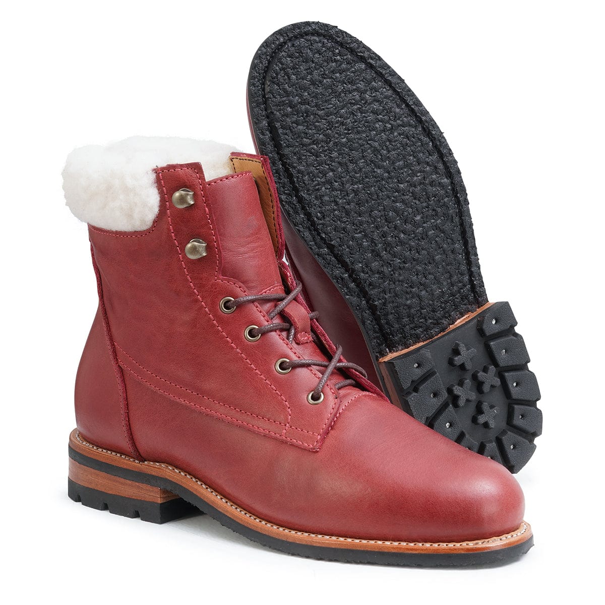 Women's narrow A-width shearling-lined red leather winter boot, shown with the sole turned up, built to order, even in size 5
