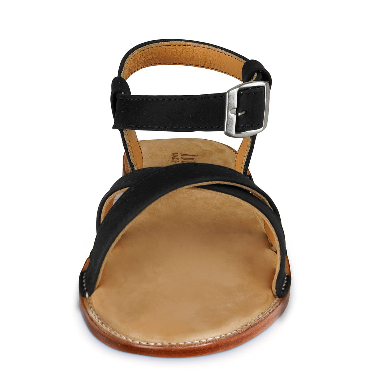 Black leather women's sandal with adjustable ankle strap, silver buckle, and cushioned footbed, handcrafted by Adelante.