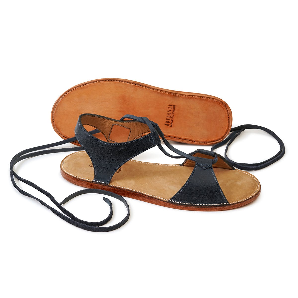 Women's black gladiator sandal with wraparound laces and a tan leather footbed by Adelante Made-To-Order