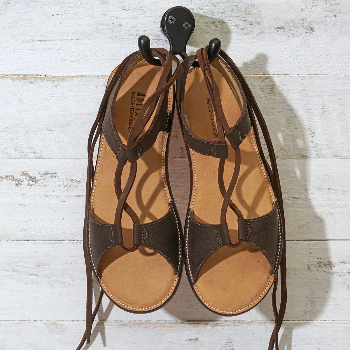 Womens brown gladiator sandals with wraparound lace detailing handcrafted by Adelante artisans