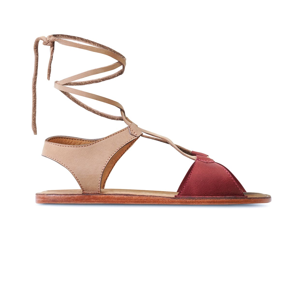 Women's tan and red gladiator sandal with wraparound ankle laces, handcrafted by Adelante artisans and available in wide widths