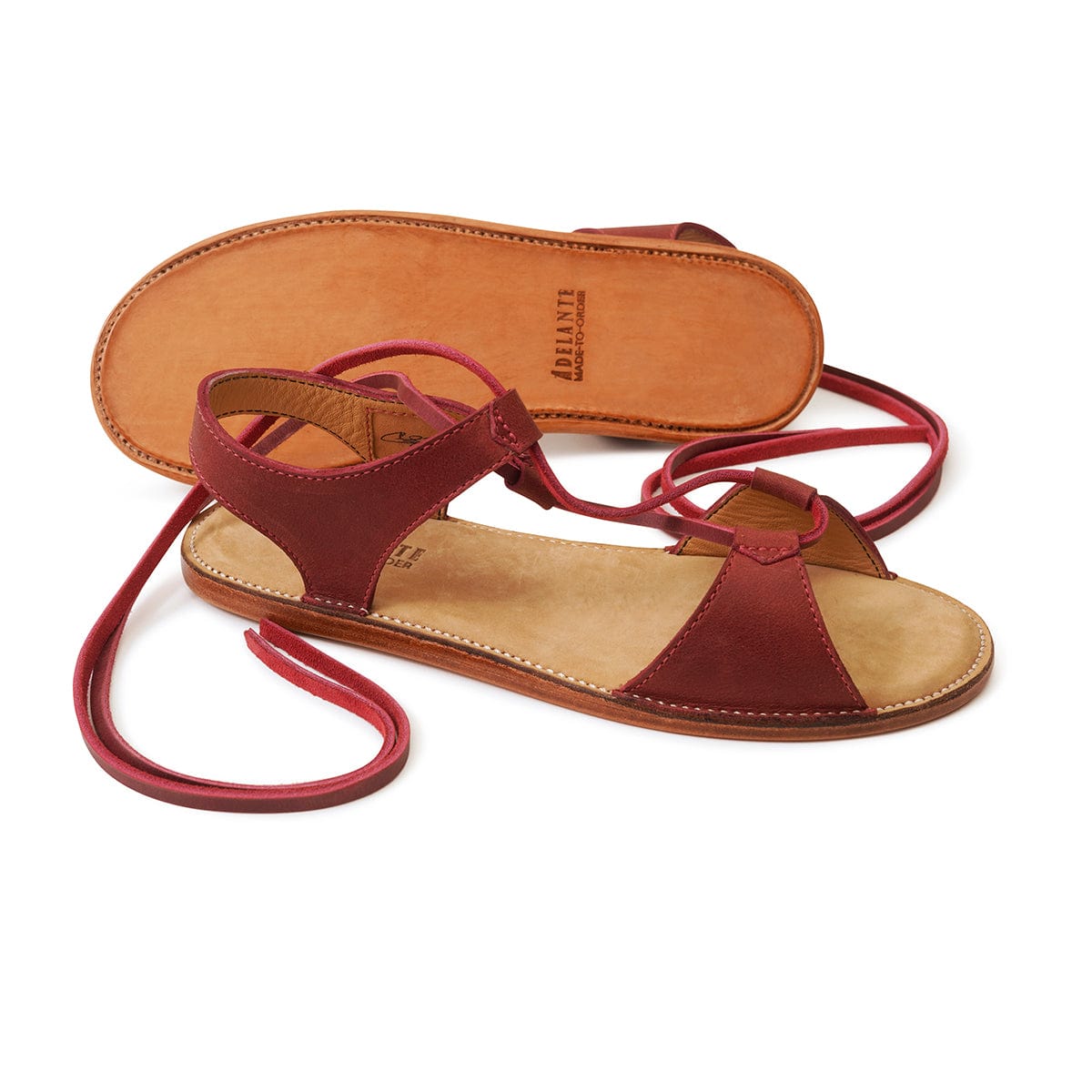 Burgundy women's gladiator sandals with wraparound laces handcrafted by Adelante Made-To-Order