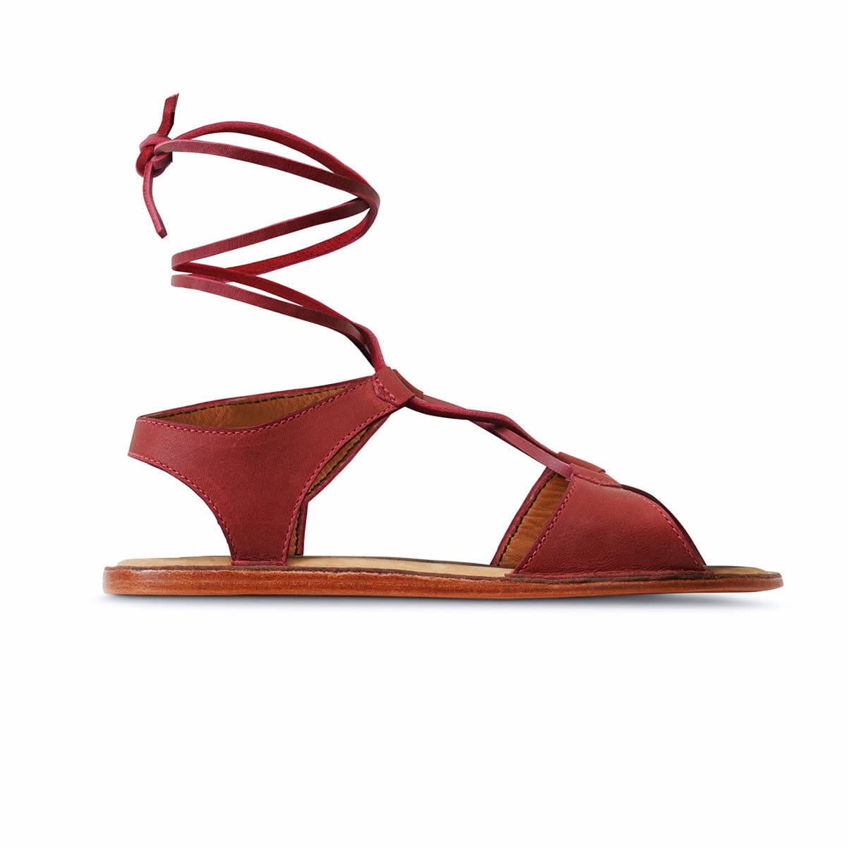 Red womens gladiator sandal with wraparound ankle laces and flat sole available in wide widths
