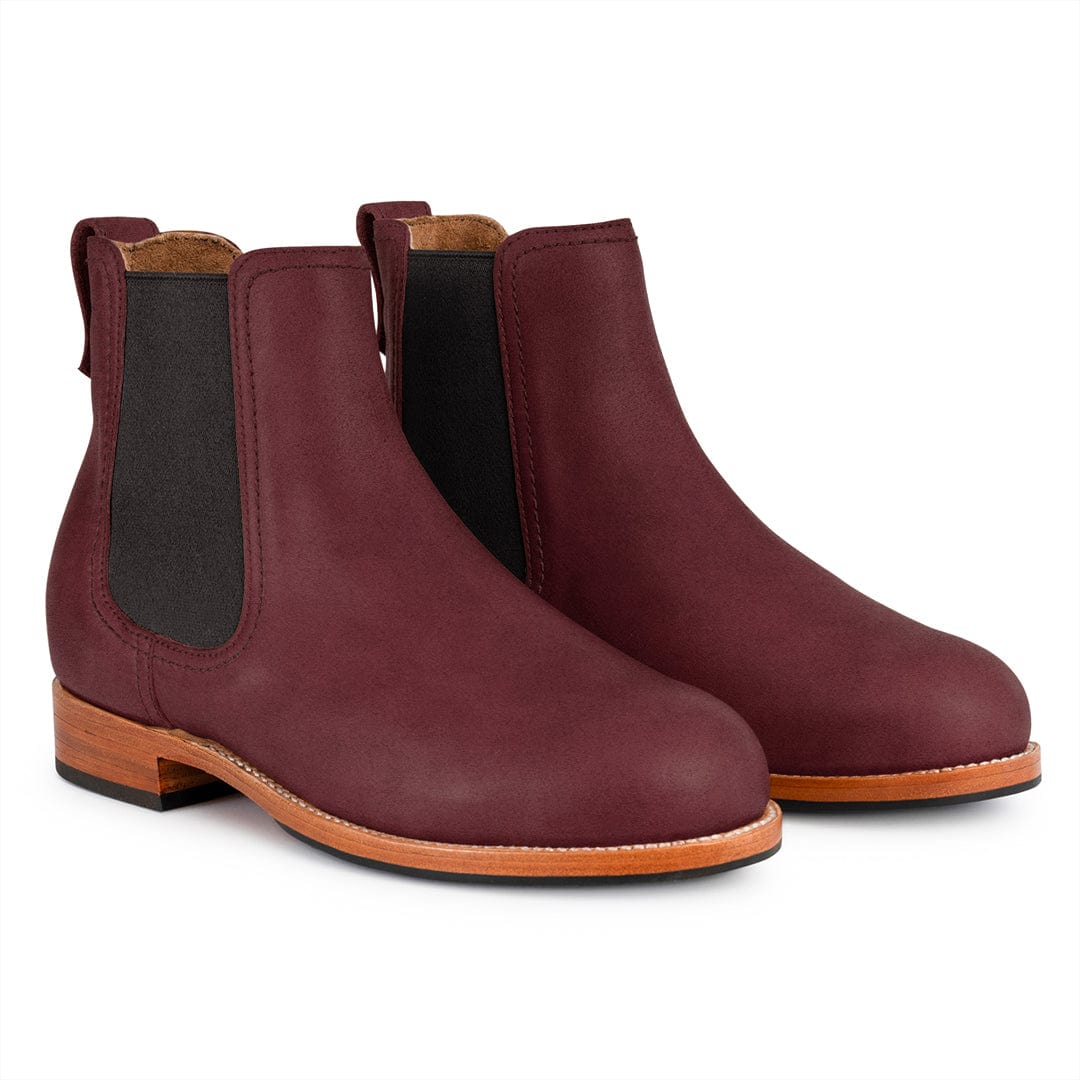 Burgundy women's Chelsea boots with black elastic panels, pull tabs, contrast stitching, and stacked walking heels by Adelante Made-To-Order