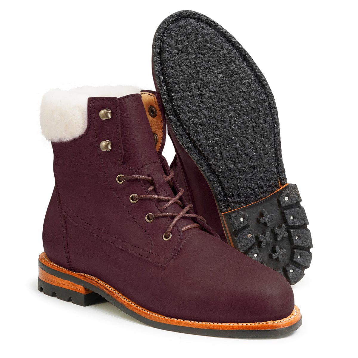 Women's EE wide shearling-lined purple leather winter boot, showing the leather sole, made to your exact length and width