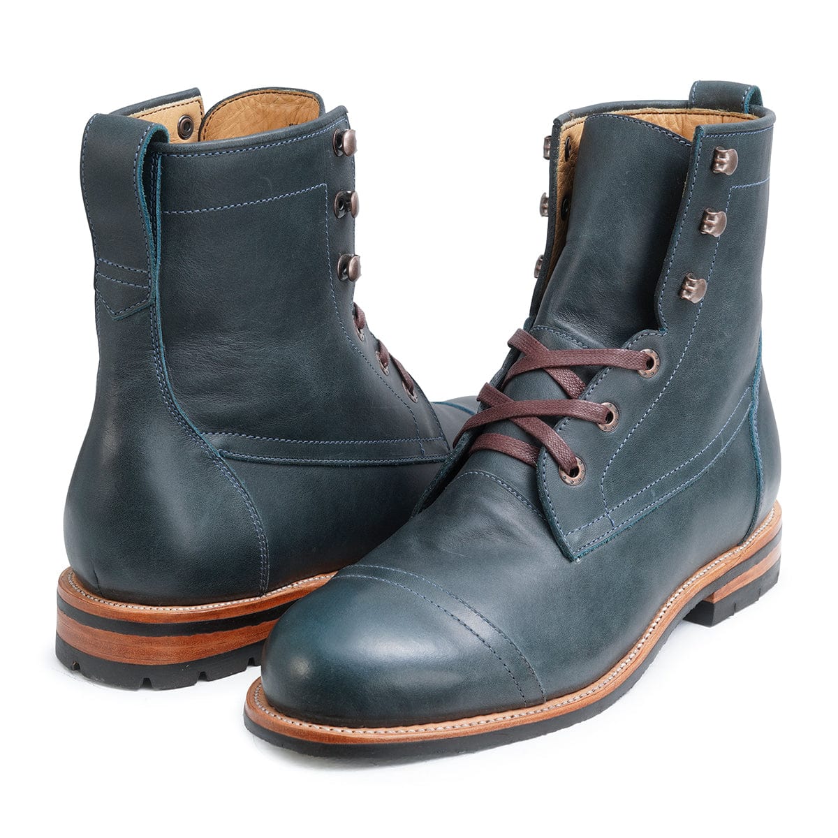 Pair of men's extra-wide blue leather lug sole boots, shown from the front at an angle, each pair made to order – The Rugged Havana