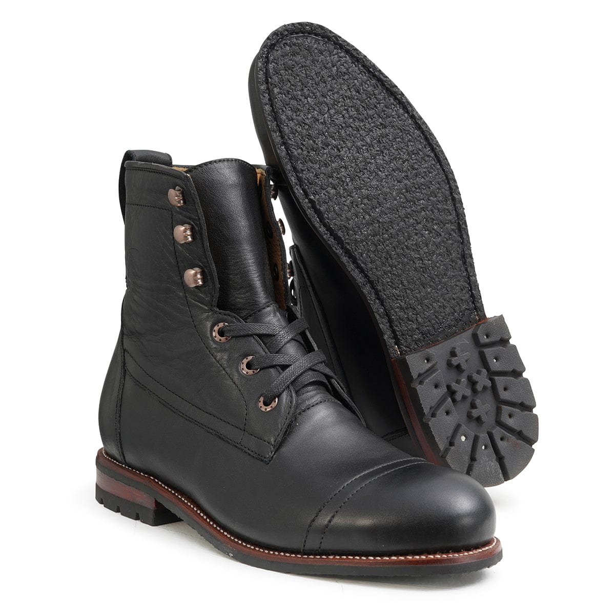 Men's 3E-wide black leather lug sole boot, showing the leather sole, made by hand in Guatemala – The Rugged Havana