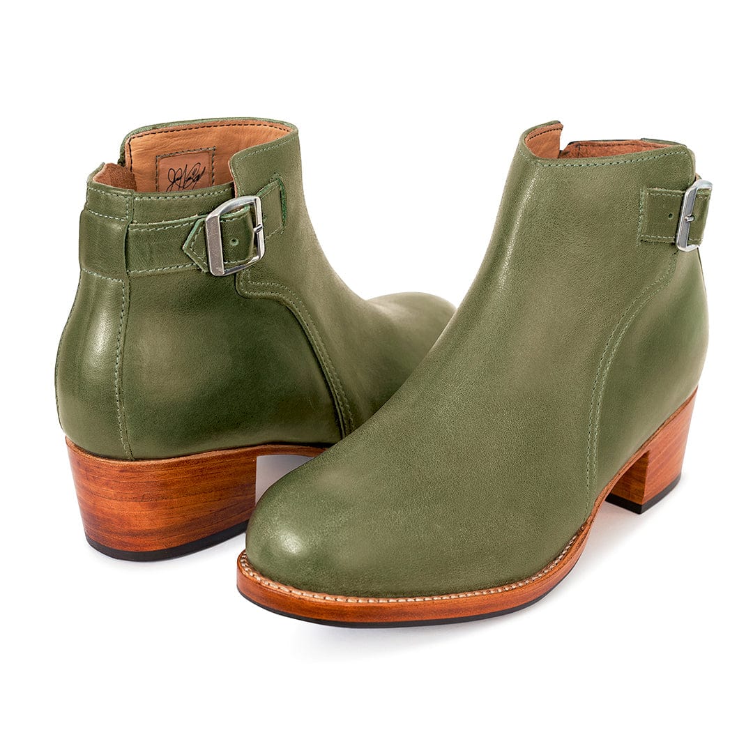 Olive green women's buckle booties with adjustable straps, inside zippers, and stacked block heels, handcrafted by Adelante in wide widths.