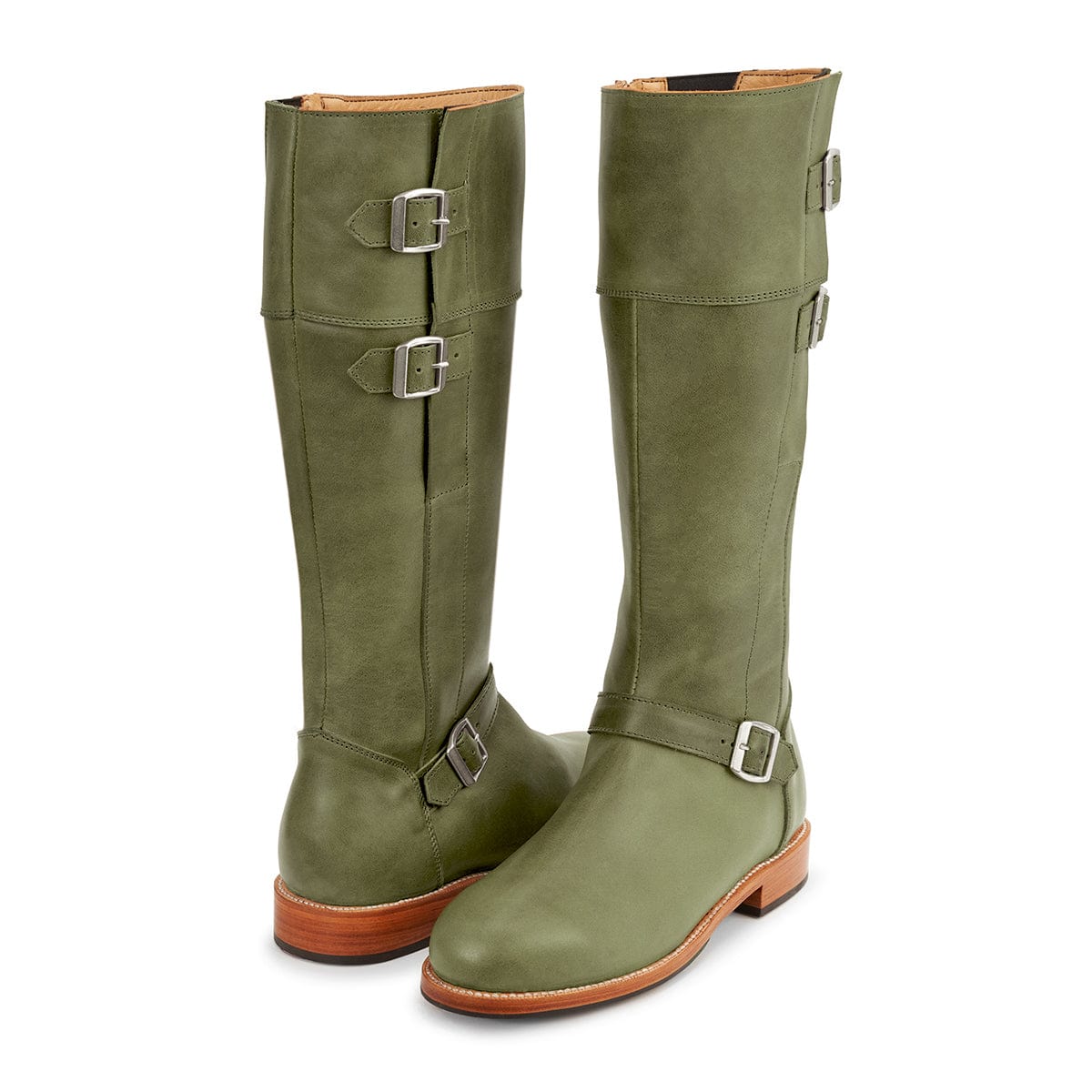 Olive green womens tall riding boots with wraparound buckle straps and leather soles. Handcrafted by Adelante with nine calf width options