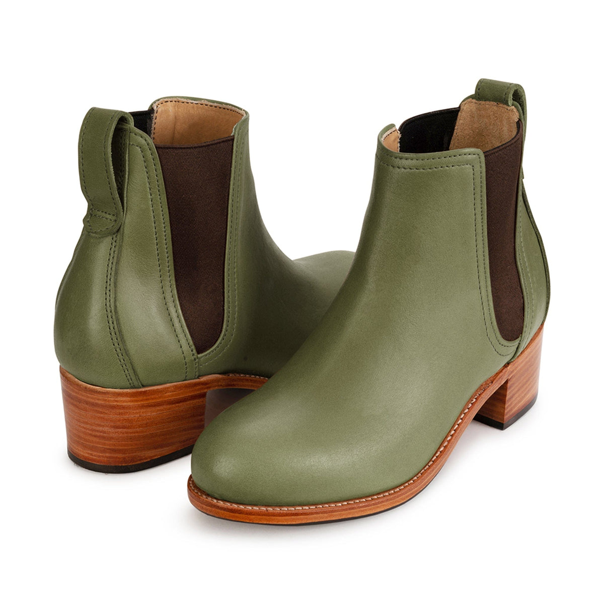 Women's wide green leather heeled Chelsea boots, shown at an angle, built to order, even in size 13 – The Catalina