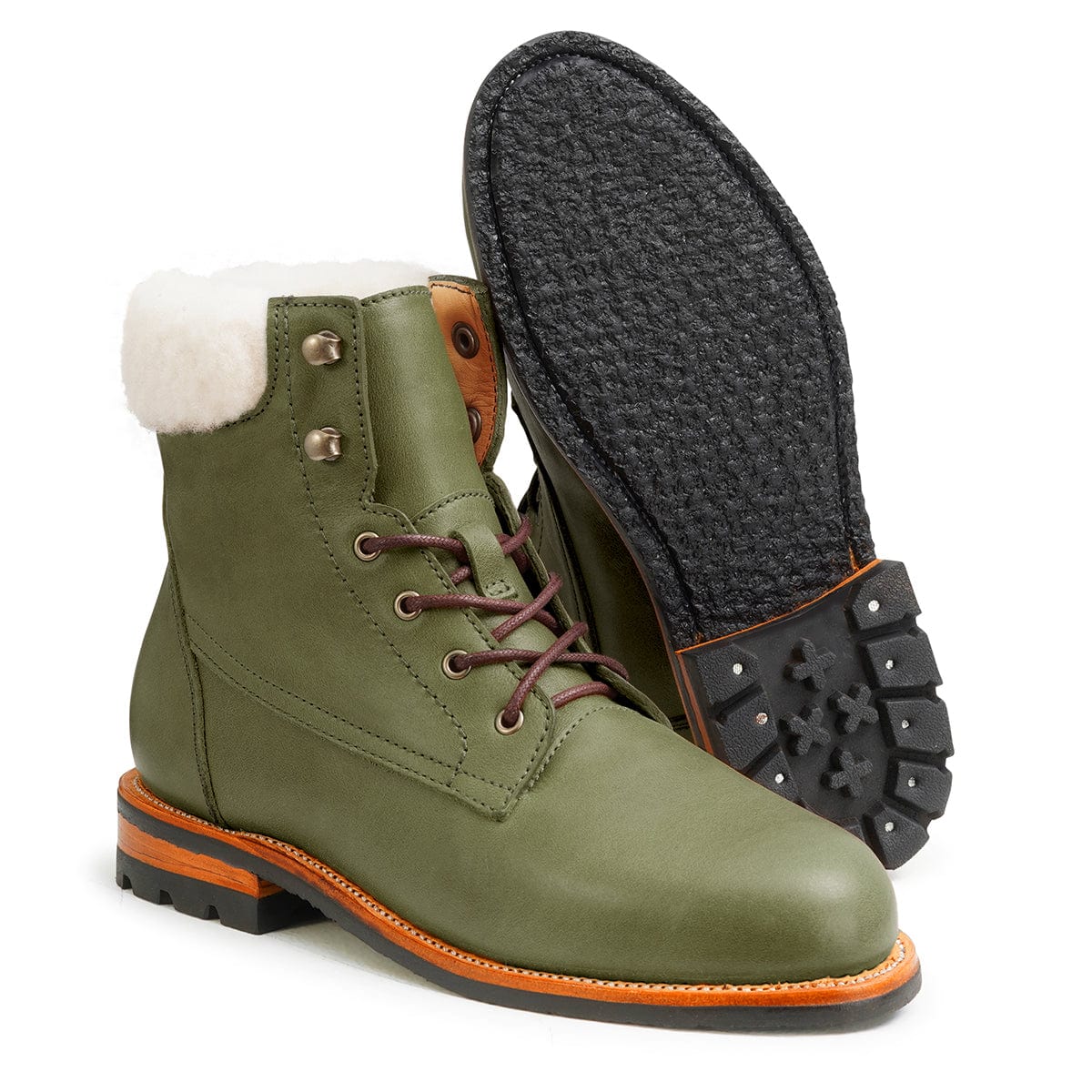 Women's EE wide shearling-lined green leather winter boot, showing the leather sole, made to order for hard-to-fit feet