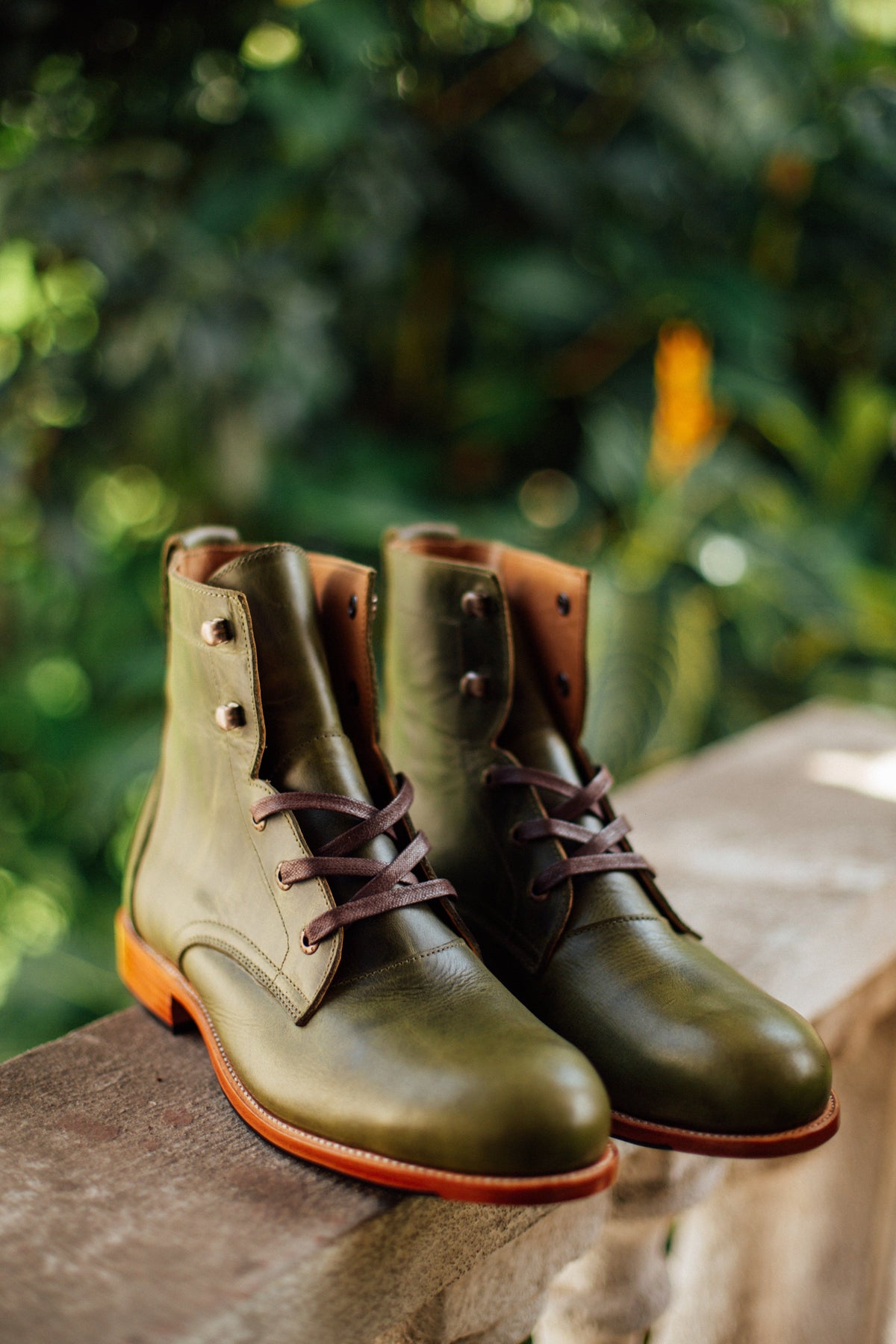 Adelante handcrafted olive green men's lace-up leather boots with brown laces and durable Goodyear welt soles