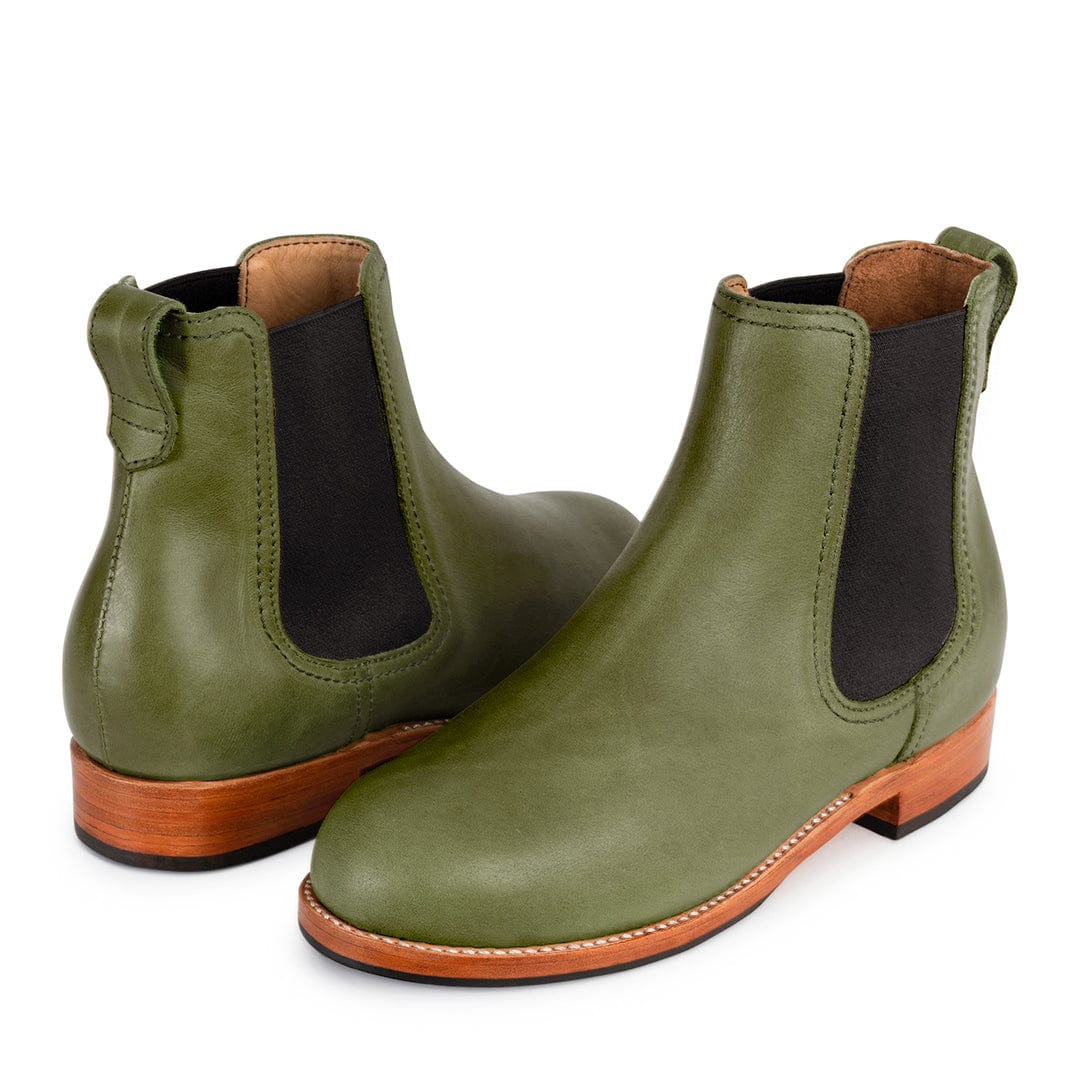 Olive green women's Chelsea boots with black elastic panels contrast stitching pull tabs and stacked wooden heels in narrow to extra wide widths