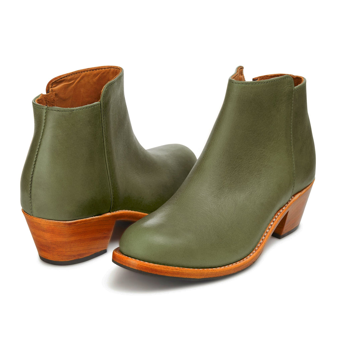 Adelante women's olive green leather ankle booties with tapered wood heels, available in narrow, regular, wide, and extra wide widths