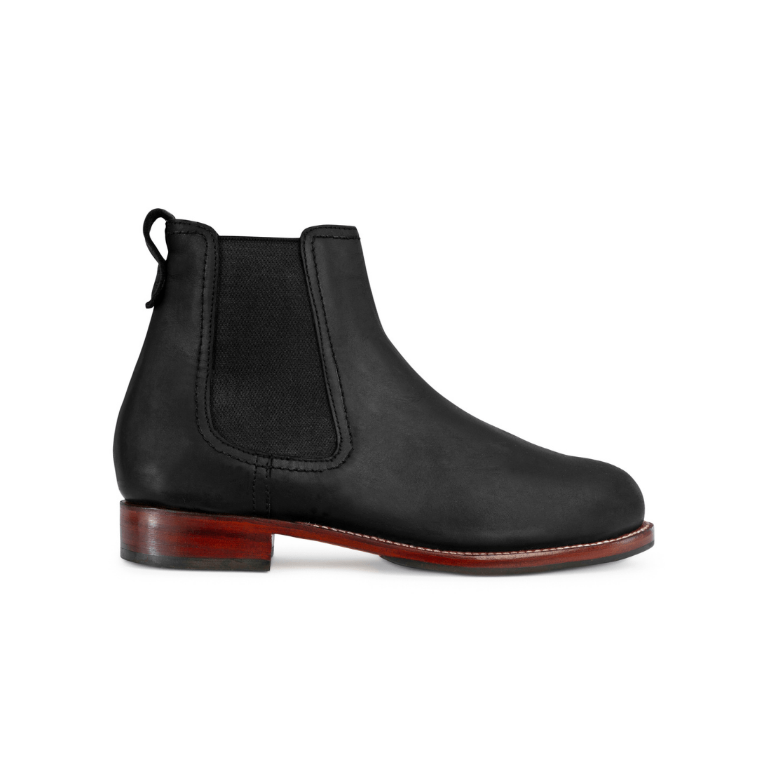 Black women's Chelsea boot with elastic side panel, contrast stitching, and red brown heel by Adelante, available in wide widths