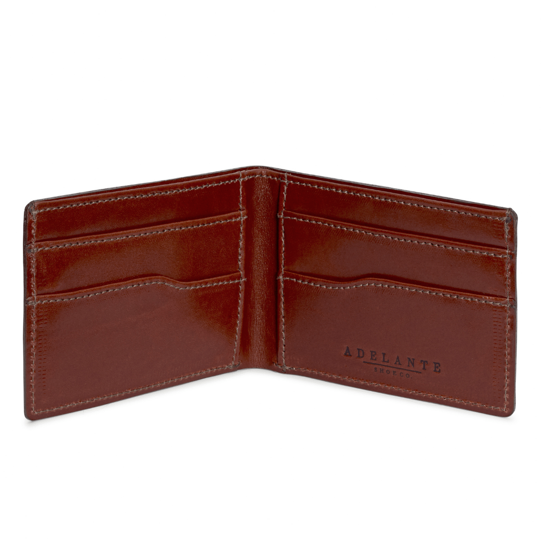 Reddish brown leather bi-fold wallet, open to show the card slots, made to order in Guatemala