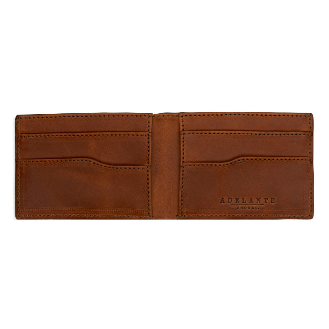 Light brown leather bi-fold wallet, open to show the card slots