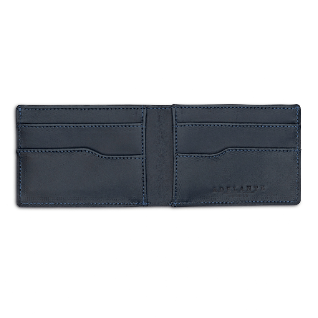 Blue leather bi-fold wallet, open to show the card slots, stitched by hand in Guatemala
