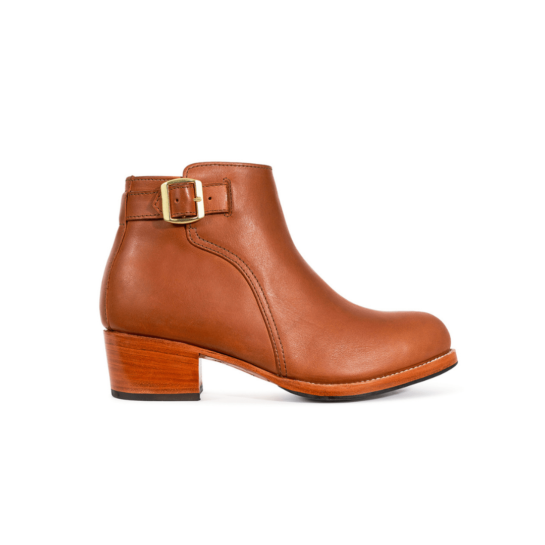 Women's brown buckle bootie with adjustable ankle strap and stacked block heel