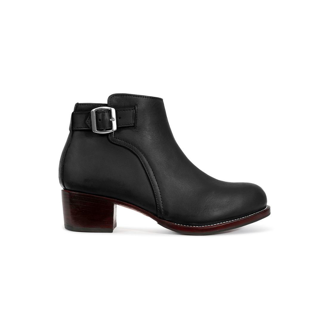 Black women's buckle bootie with a block heel and side zipper, available in narrow, regular, wide, and extra wide widths