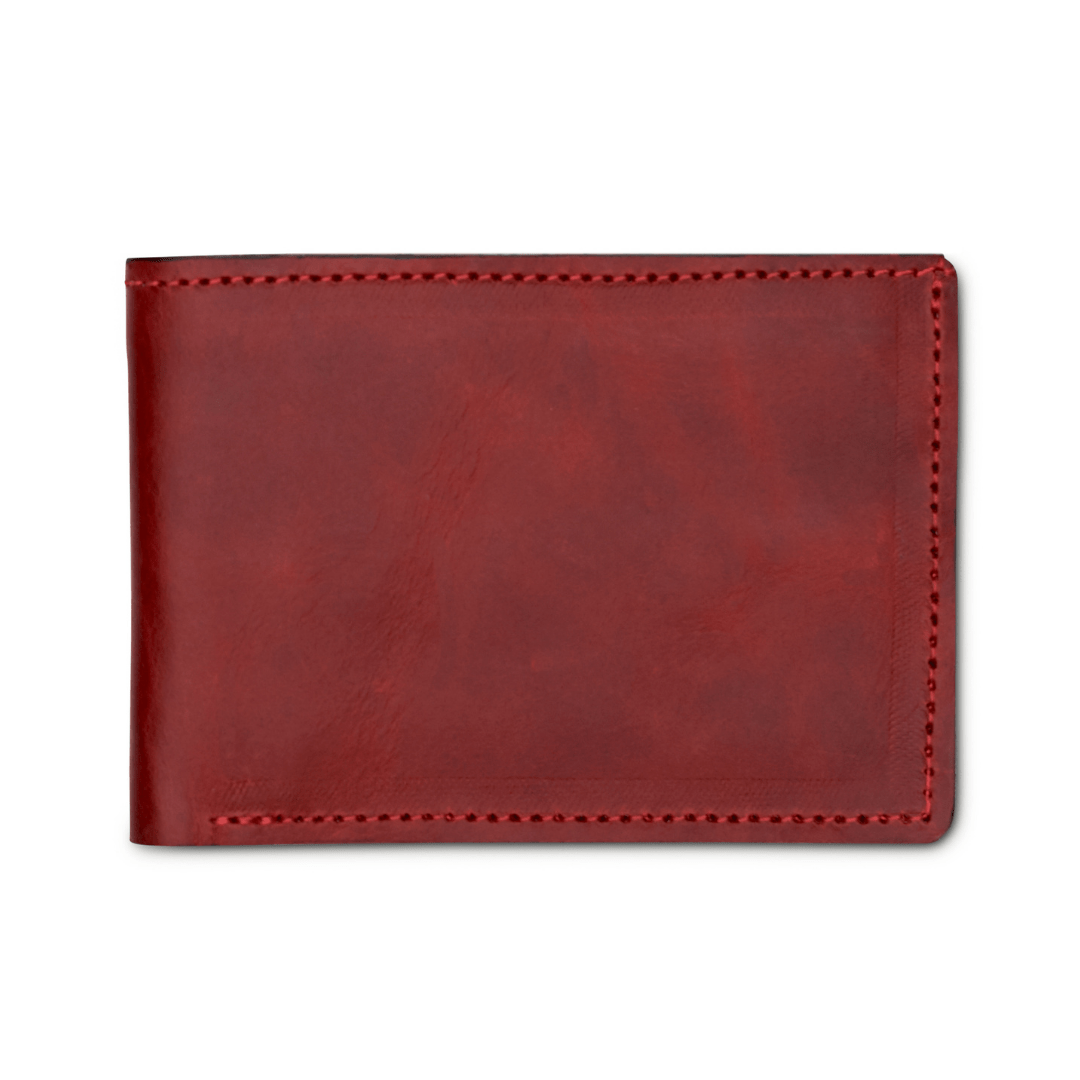 Red leather bi-fold wallet, closed, handcrafted and made to order