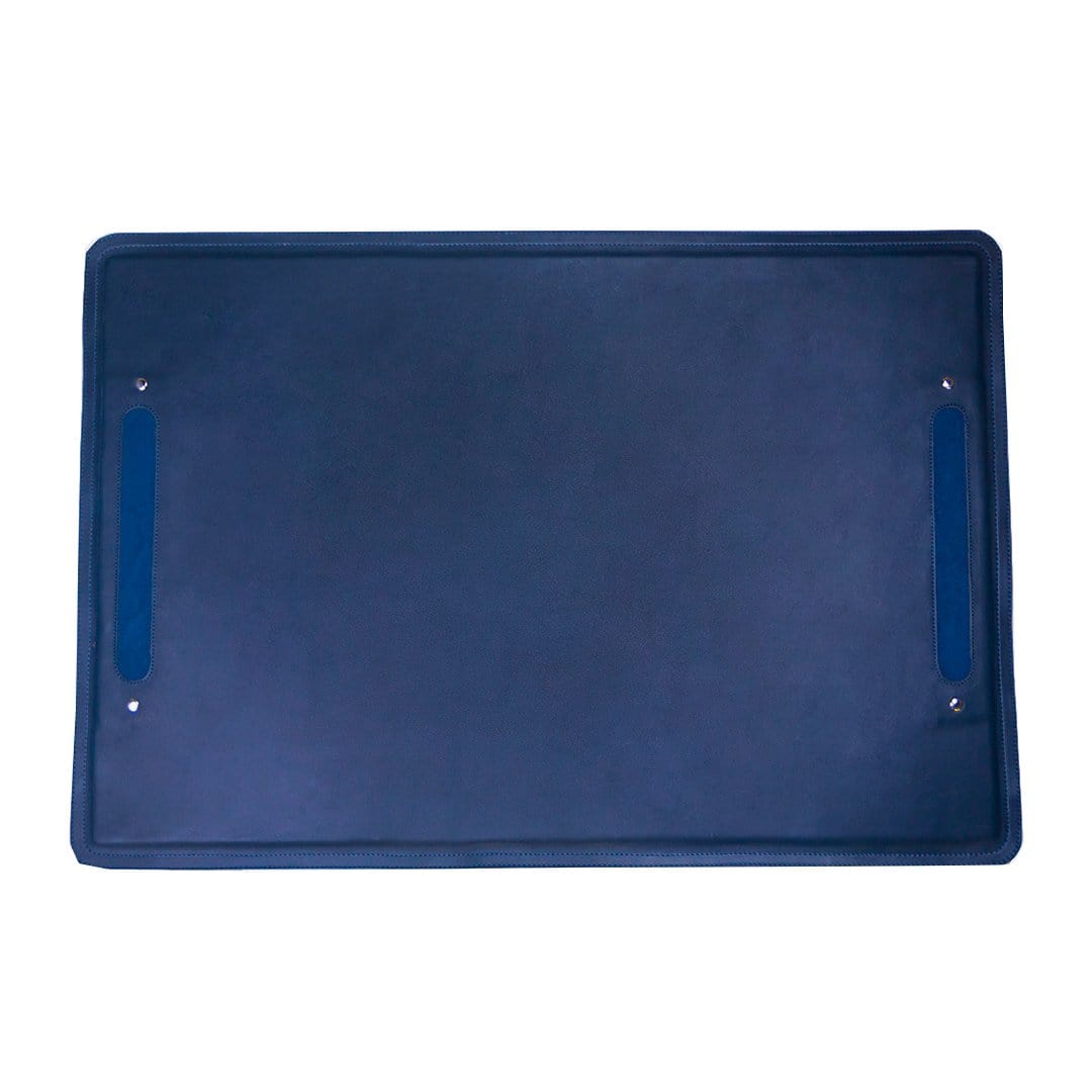 Navy leather desk mat with stitched edges and vertical pen slots