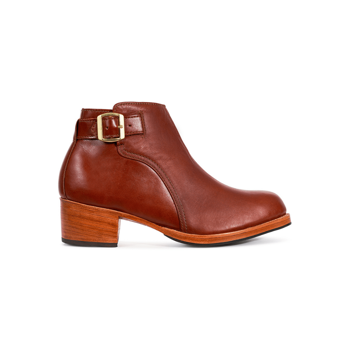 Women's brown buckle bootie with block heel by Adelante, available in narrow to extra wide widths