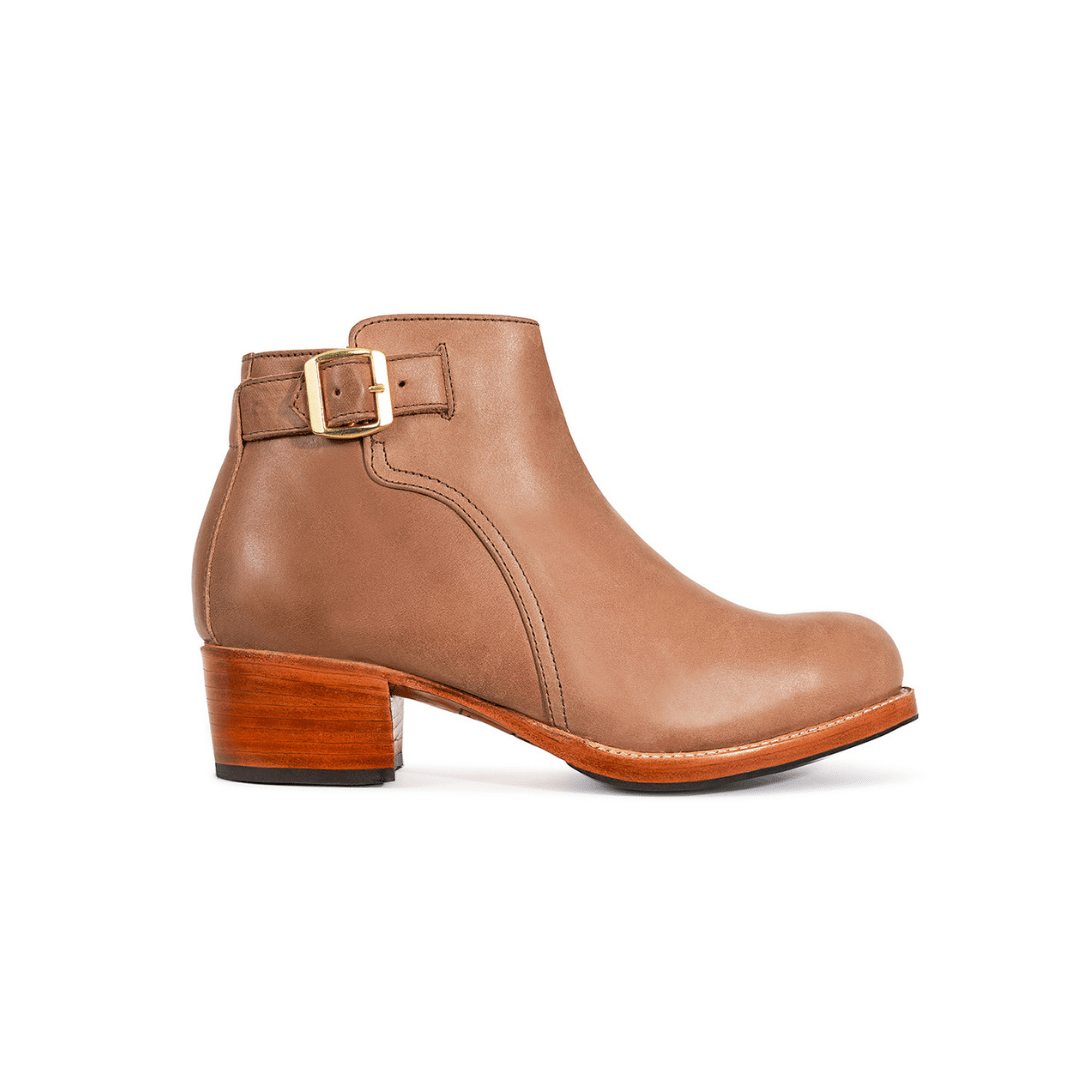 Adelante women's tan buckle bootie with block heel, handcrafted in Guatemala and available in sizes 4 to 15 and widths A to EEE