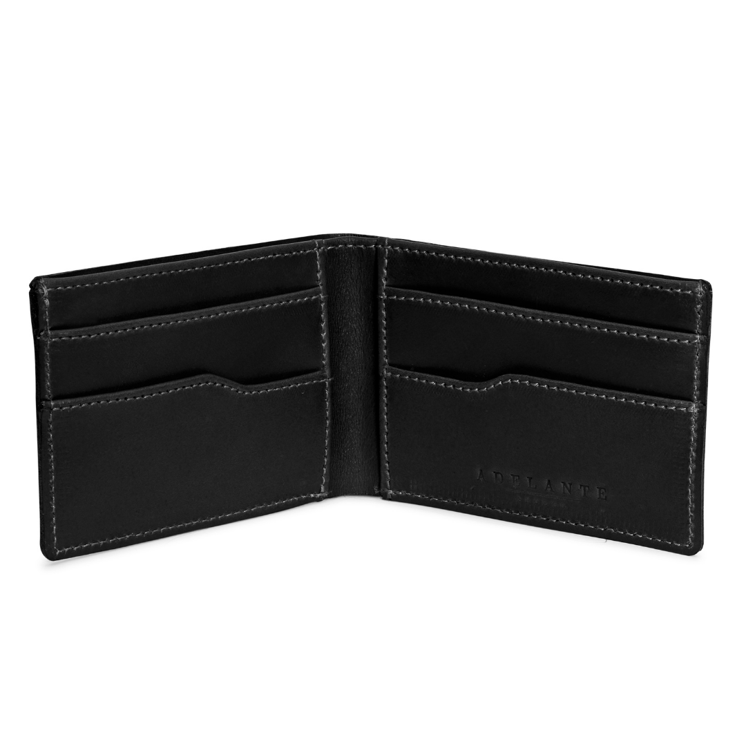 Black leather bi-fold wallet, open to show the card slots