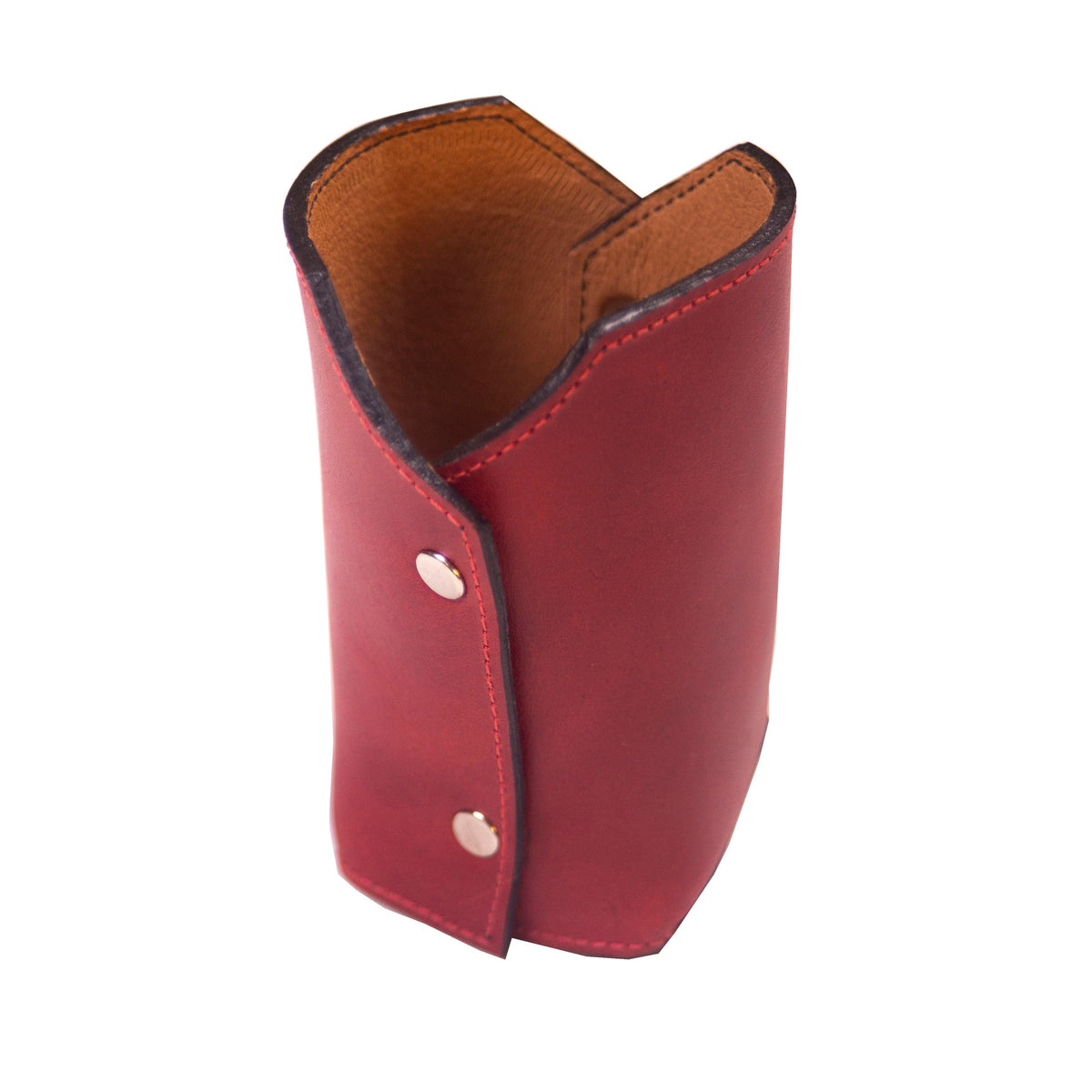 Red leather pencil cup with snap closures and contrast stitching handcrafted by Guatemalan artisans